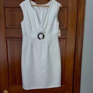 Elegant White Sleeveless Dress with Ring Detail